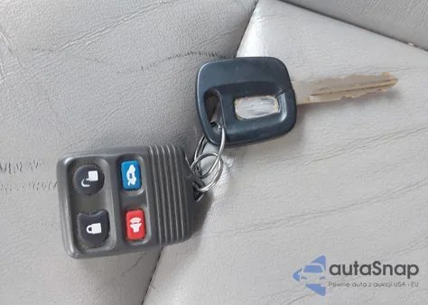 1999 Lincoln Continental z USA, uszkodzony, nr VIN 1LNHM97V7XY607937